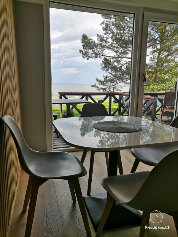 Kotedžas su terasa Nidoje ir kiti apartamentai