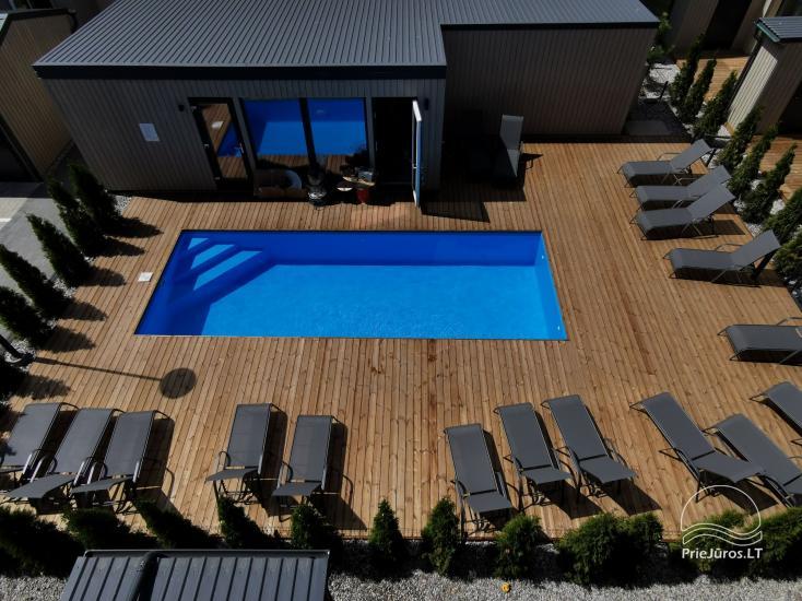New apartment with heated pool surrounded by pine forest