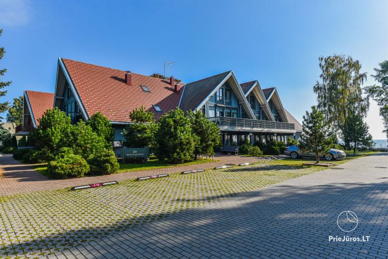 Preilos namai 3 kambarių apartamentai ant marių kranto.