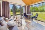 Atpūtas komplekss „Pazust Priedēs“ ar dizaina brīvdienu mājām un SPA