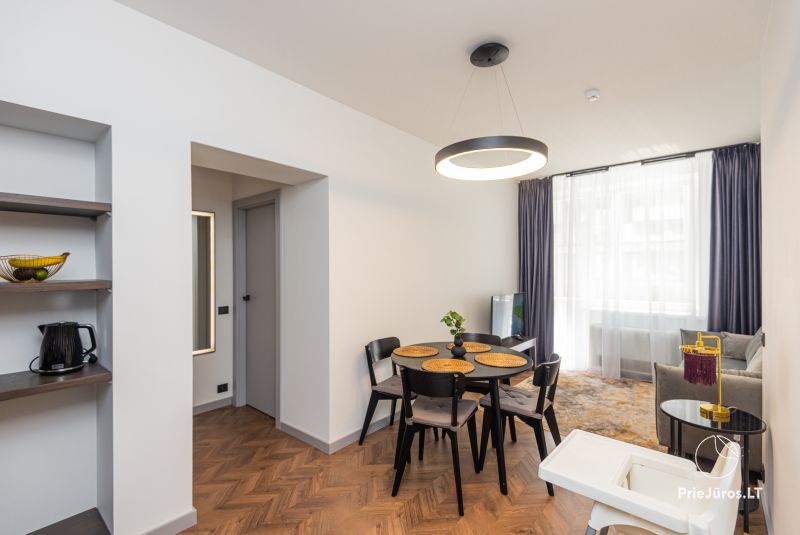 D21 Apartamentai – jauki prabanga Palangos širdyje