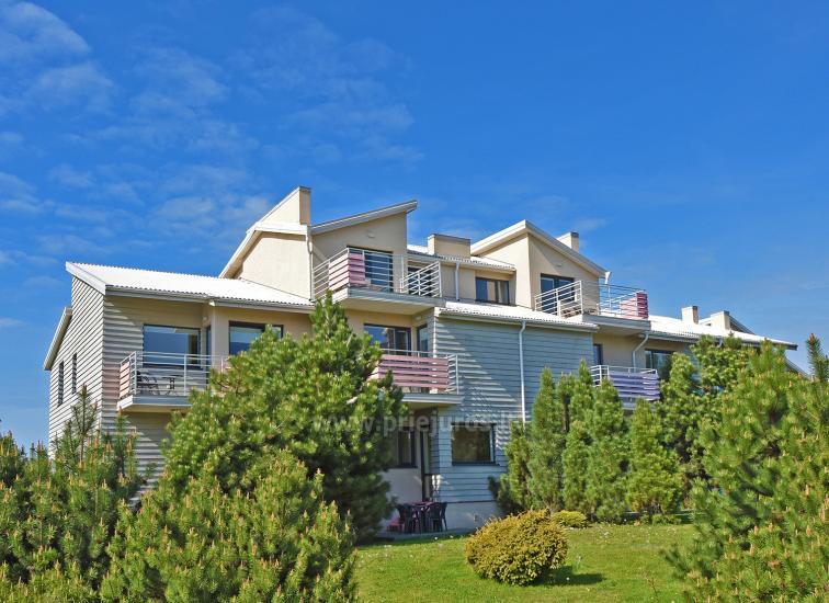 Vila Verbena Palangoje: 2-3 kambarių apartamentai su atskirais įėjimais, balkonu ar terasa, virtuve. 7min. iki jūros!