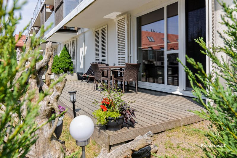 Kopų Vėtrungės apartamentai Nidoje: 2 kambariai,erdvi terasa,sūpynės vaikams